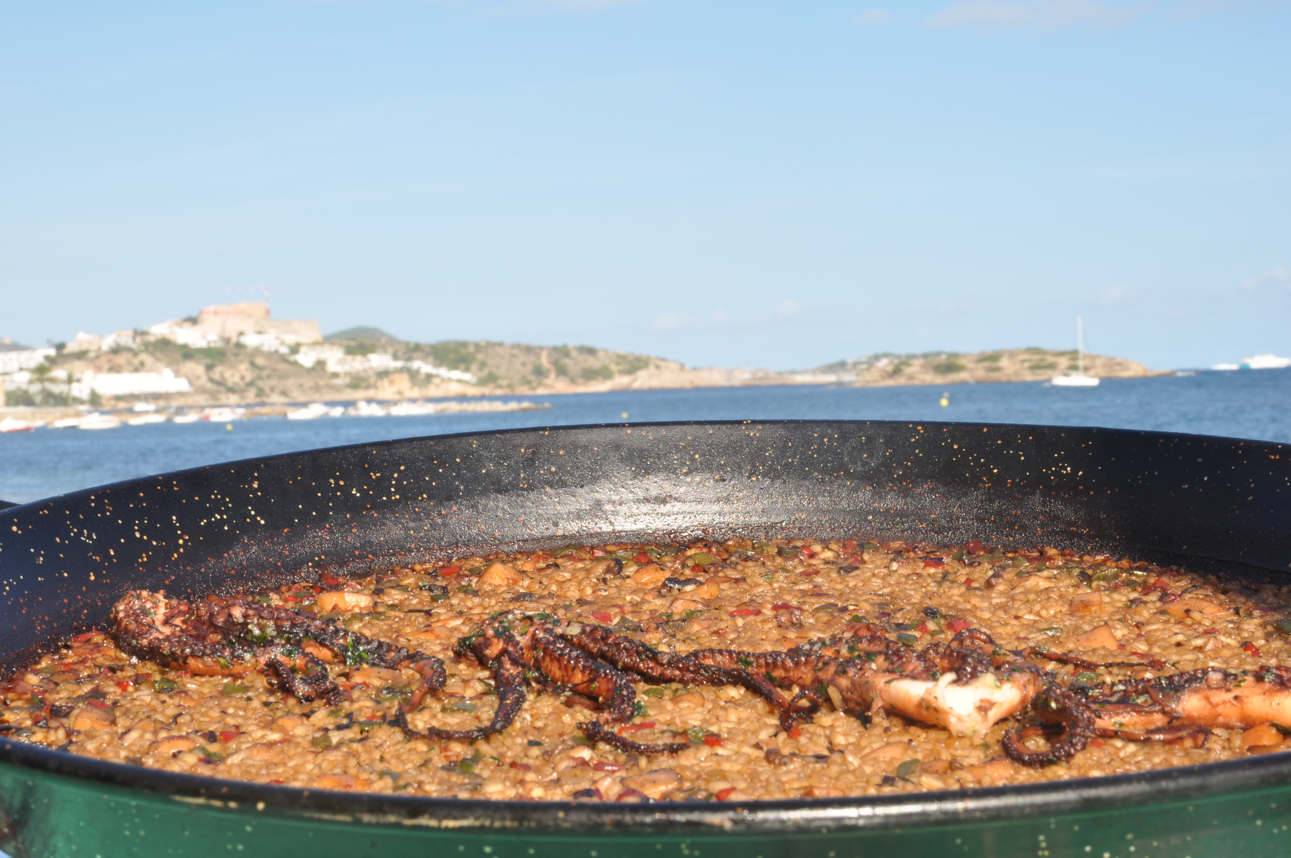 Paella with Ibiza's Castle in background